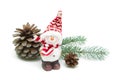 Toy snowman and pine cones on a white background close-up Royalty Free Stock Photo
