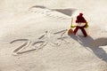 Toy snowman on the sand Royalty Free Stock Photo