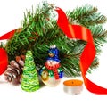 Toy snowman under a branch of an artificial Christmas tree Royalty Free Stock Photo
