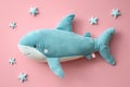 toy soft plush blue shark on a pink background Royalty Free Stock Photo