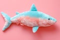 toy soft plush shark in pastel colors on a pink background Royalty Free Stock Photo