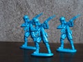 Toy soldiers on woodwn table Royalty Free Stock Photo