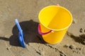 Toy Spade and Bucket in Sand Royalty Free Stock Photo