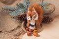 Toy squirrel under ther Christmas tree Royalty Free Stock Photo