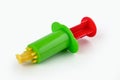 Toy syringe press for playdough Royalty Free Stock Photo