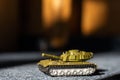 Toy tank with camouflage color. Military vehicles toy. Simple cheap toys for children, warfare, warzone vehicles Royalty Free Stock Photo