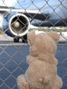 The Toy Teddy Bear meets plane at the airport Royalty Free Stock Photo