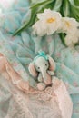 Toy teddy elephant and a bouquet Royalty Free Stock Photo