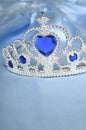 Toy tiara with diamonds and blue gem Royalty Free Stock Photo