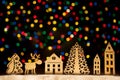 Toy town - Xmas lights stars, Christmas tree, vintage wooden dec Royalty Free Stock Photo