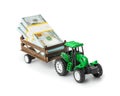 Toy tractor with money Royalty Free Stock Photo