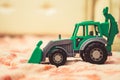 A toy tractor in the nursery Royalty Free Stock Photo