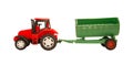 Red toy tractor with green trailer Royalty Free Stock Photo