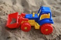 Toy tractor on the sand Royalty Free Stock Photo