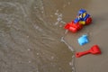 Toy tractor on the sand Royalty Free Stock Photo