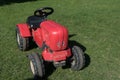 Toy tractor standing on the grass