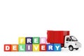 Toy truck and cubes with words FREE DELIVERY isolated. Logistics and wholesale concept