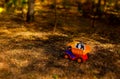 Toy truck and hardhat outdoors in the garden Royalty Free Stock Photo
