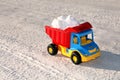 Toy truck removes snow