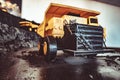 Toy truck in the scenery of coal mining