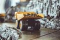 Toy truck in the scenery of coal mining