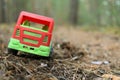 Toy truck on a shady forest road Royalty Free Stock Photo
