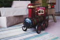 Toy vintage steam locomotive on the floor Royalty Free Stock Photo