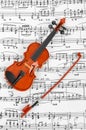 Toy violin and music sheet Royalty Free Stock Photo