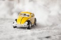 Toy Volkswagen Beetle in Snow Royalty Free Stock Photo