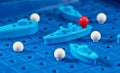 Toy war ships and submarine are placed on the blue playing Boar Royalty Free Stock Photo