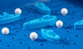 Toy war ships and submarine are placed on the blue playing Boar Royalty Free Stock Photo