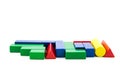 Toy wood block multicolor building construction bricks isolated on white background.