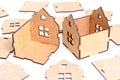 Toy wooden houses and parts on white Royalty Free Stock Photo