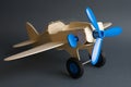 Toy wooden plane with blue propeller
