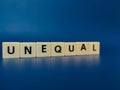 Toy word with the word UNEQUAL Royalty Free Stock Photo