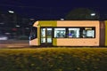 Toyama Tramcar passing in front of Toyama Chuo Post office in the night