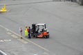 A Toyota forklift moving boat dock ramps