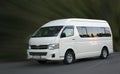 Toyota Hiace white minivan.