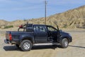 A Toyota Hilux Pick Up Truck parked next to the Pan American Highway