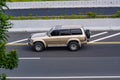 Toyota Land Cruiser J80 driving fast on trans jawa highway toll road Royalty Free Stock Photo