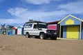 Toyota Land Cruiser J70 driving on sand along the Iconic Bathing Boxes of the Mornington Peninsula Victoria Australia Royalty Free Stock Photo