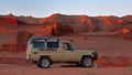 Toyota Land Cruiser in paleontological expedition to Herman Tsav Canyon. Martian landscape