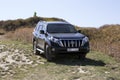 Toyota Land Cruiser Prado black car.