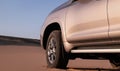 Toyota Land Cruiser Prado standing in the middle of the desert