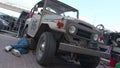 Toyota Landcruiser FJ40, 1960 from Brazil, repairman fixing car