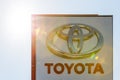 Toyota logo on promotional stand at sunny day - Toyota Motor Corporation is a Japanese automotive manufacturer.