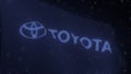 TOYOTA logo on a waving digital flag, editorial 3d rendering