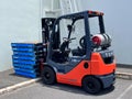 TOYOTA LPG (Liquefied petroleum gas) Forklift Truck parking outside industrial wearhouse Royalty Free Stock Photo