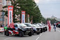Toyota, Mini and other rally cars parked on the square during Silk way rally Royalty Free Stock Photo