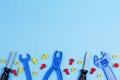 Toys background. Toy tools on blue background. Top view Royalty Free Stock Photo